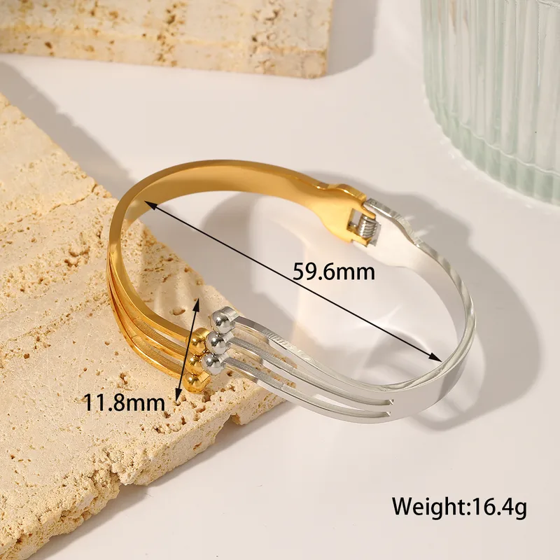 Statement Design Gold and Silver Bangle Stainless Steel
