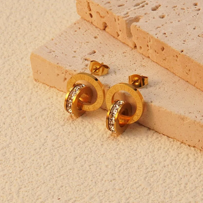 Large Gold Roman Numeral Interlocking Zircon Stud Earrings